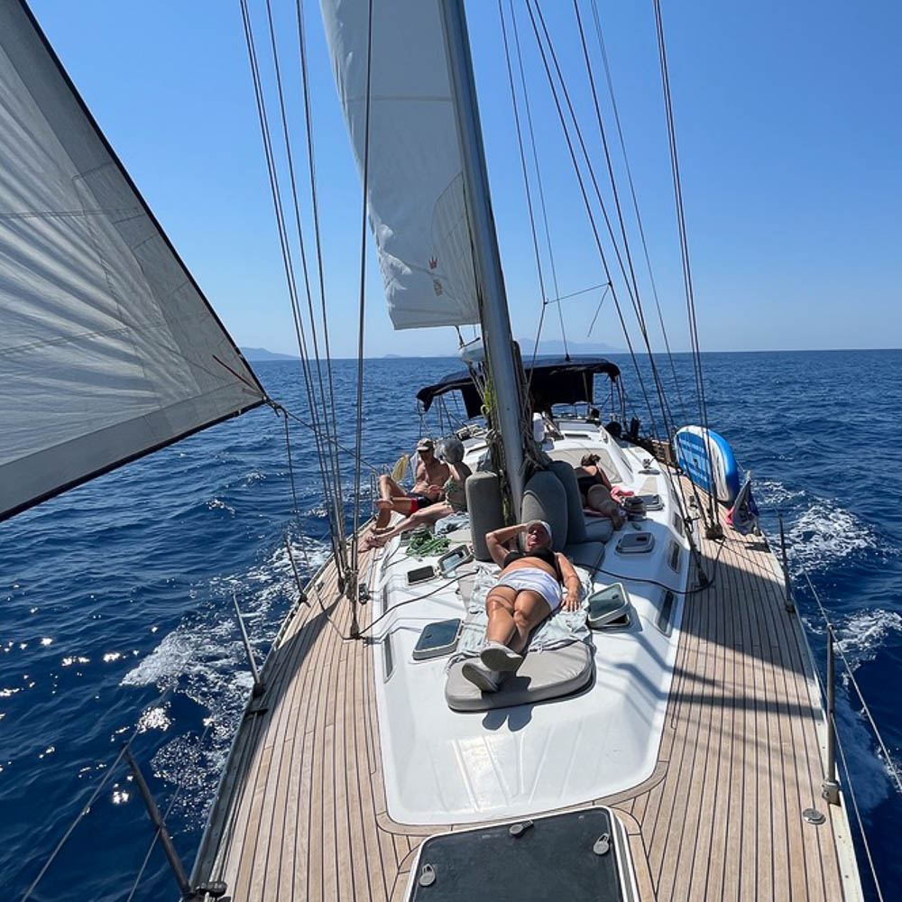 People in sailing holiday for solo travellers in Greece