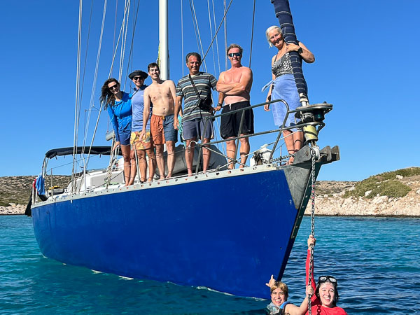 Share boat group of people on Artemis during sailing holiday in Greece