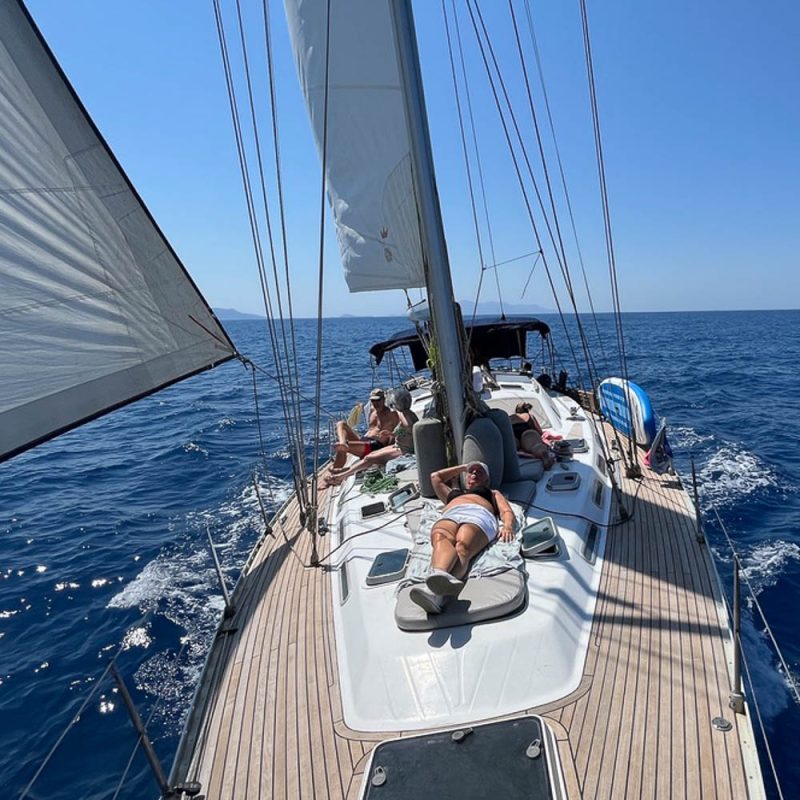 People in sailing holiday for solo travellers in Greece